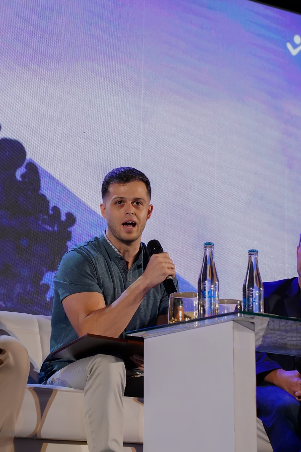 Jordan on stage at industry conference panel